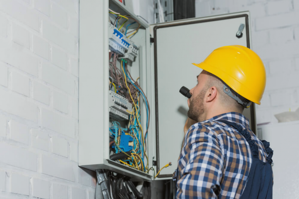 What are the steps to become an electrician in the UK